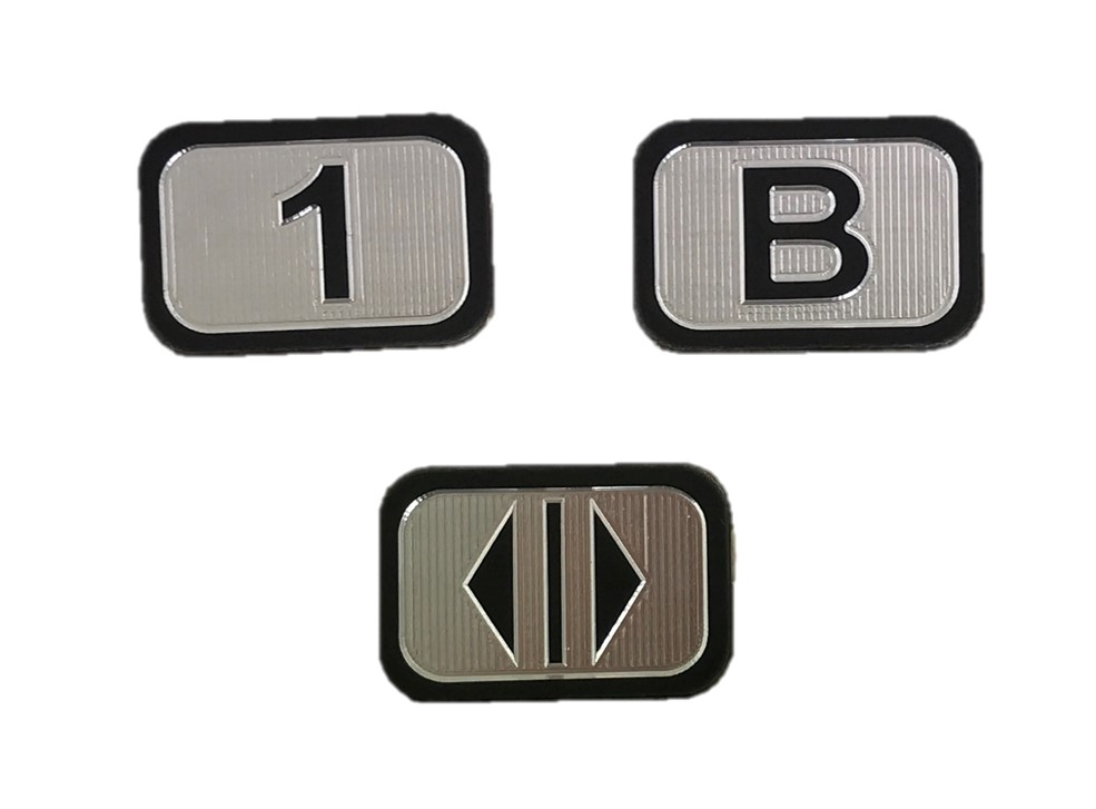 Tryckbricka 2535-S, alu. med svart relief, horisontell, ''1''